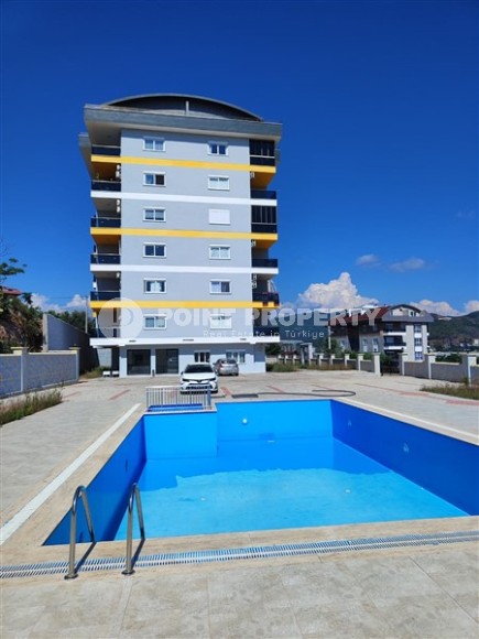 Новая квартира с мебелью и бытовой техникой, в 750 метрах от моря, в районе Демирташ-id-6196-фото-13