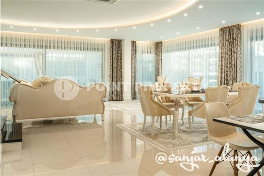 Фешенебельный садовый дуплекс с пятью спальнями, 210м², в элитном комплексе Каргыджака, Алания-id-1489-фото-2