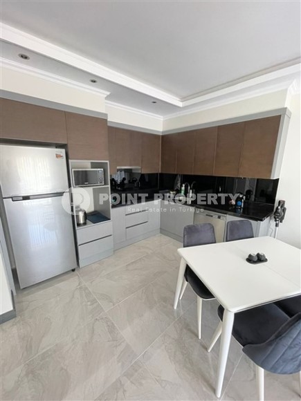 Modern 1+1 apartment, on an area of 63 m2, in the center of a picturesque, quiet area of Alanya - Kargicak-id-6204-photo-4