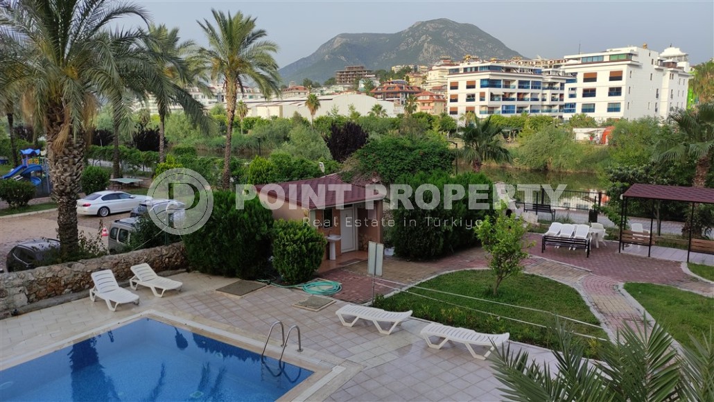 Квартира в симпатичном жилом комплексе 2008 года постройки, в центре района Тосмур-id-6214-фото-12