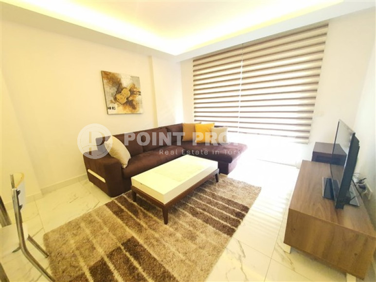 Двухкомнатная квартира, 67м², в комплексе премиум класса в 300м от моря в Махмутларе, Аланья.-id-1491-фото-3