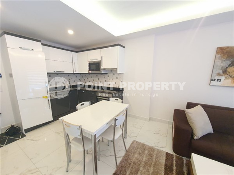 Двухкомнатная квартира, 67м², в комплексе премиум класса в 300м от моря в Махмутларе, Аланья.-id-1491-фото-5