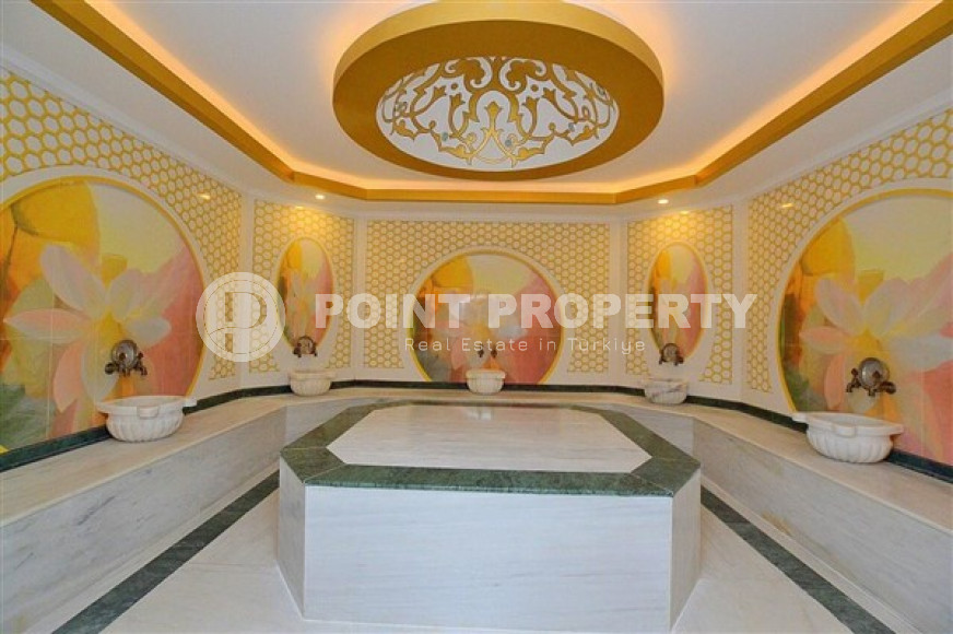 Двухкомнатная квартира, 67м², в комплексе премиум класса в 300м от моря в Махмутларе, Аланья.-id-1491-фото-18