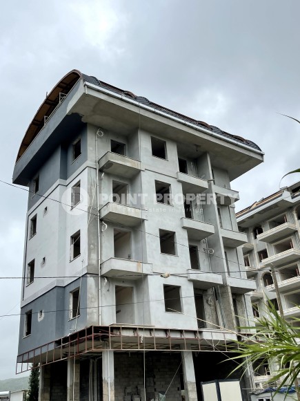 Новый инвестиционный проект - комфортабельный жилой комплекс в 600 метрах от моря, в центре района Авсаллар-id-6043-фото-12