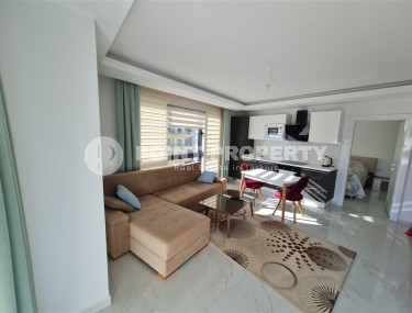 Panoramic apartment on the 8th floor, in a building built in 2015, in the center of Alanya-id-6276-photo-1