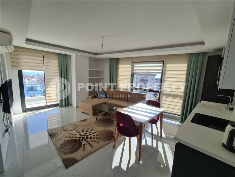 Панорамная квартира на 8-м этаже, в доме 2015 года постройки, в центре Аланьи-id-6276-фото-2