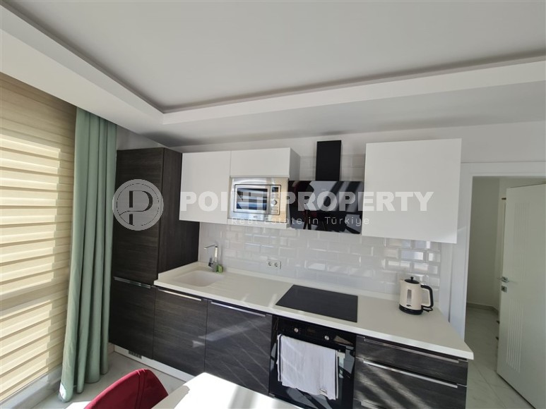 Панорамная квартира на 8-м этаже, в доме 2015 года постройки, в центре Аланьи-id-6276-фото-3