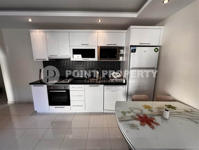 Small apartment on the 5th floor in a building built in 2017, in the center of a modern, developed area of Alanya - Mahmutlar-id-6280-photo-3