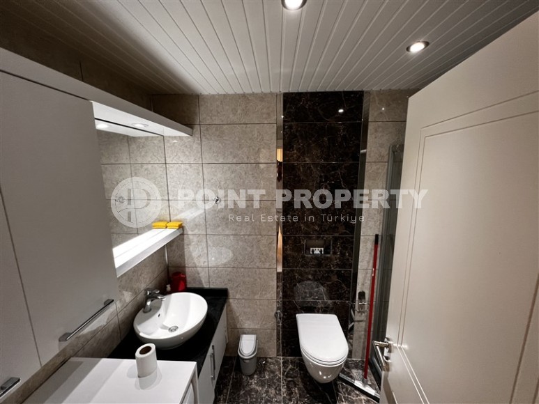 Small apartment on the 5th floor in a building built in 2017, in the center of a modern, developed area of Alanya - Mahmutlar-id-6280-photo-6