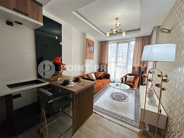 Квартира 1+1, 47м², в блоке А строящегося комплекса с комфортной инфраструктурой, в Махмутларе, Алания-id-1460-фото-2