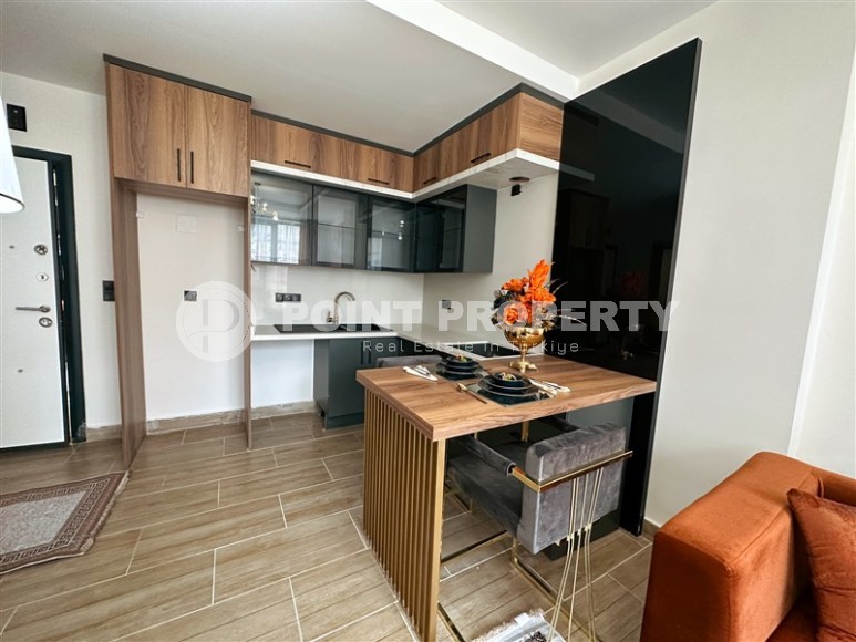 Квартира 1+1, 47м², в блоке А строящегося комплекса с комфортной инфраструктурой, в Махмутларе, Алания-id-1460-фото-4