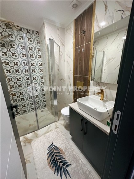 Квартира 1+1, 47м², в блоке А строящегося комплекса с комфортной инфраструктурой, в Махмутларе, Алания-id-1460-фото-13