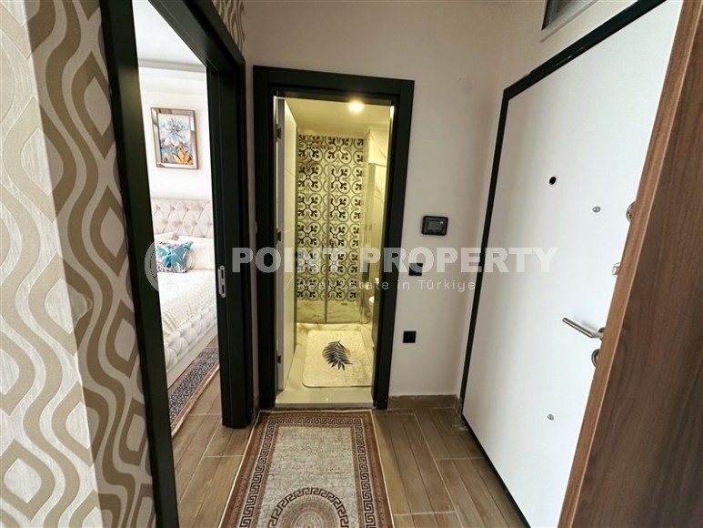 Квартира 1+1, 47м², в блоке А строящегося комплекса с комфортной инфраструктурой, в Махмутларе, Алания-id-1460-фото-15