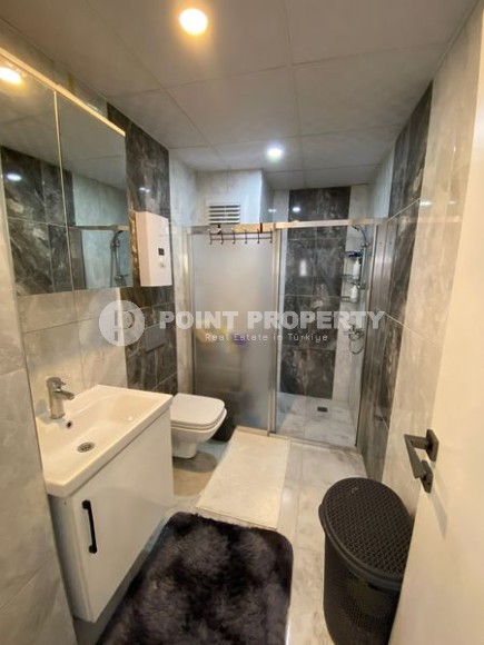 Cozy, modern apartment on the 1st floor in a building built in 2022, in the center of Alanya-id-6289-photo-9