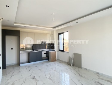 Компактная квартира с чистовой отделкой, в 700 метрах от моря, в спокойном районе Аланьи - Кестель-id-6299-фото-2