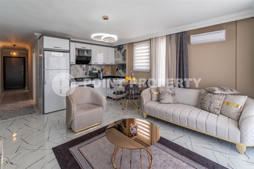 Современная, уютная квартира 1+1, на площади 70 м2, в центре популярного Средиземноморского курорта - Аланья-id-6301-фото-2