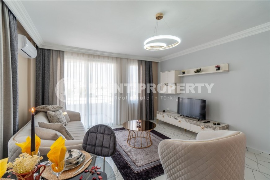 Современная, уютная квартира 1+1, на площади 70 м2, в центре популярного Средиземноморского курорта - Аланья-id-6301-фото-3