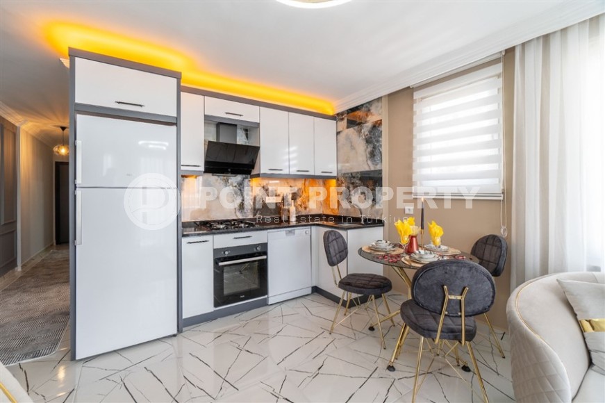 Современная, уютная квартира 1+1, на площади 70 м2, в центре популярного Средиземноморского курорта - Аланья-id-6301-фото-4