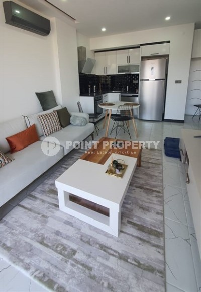 Небольшая квартира 1+1, общей площадью 55 м2, в спокойном районе Аланьи - Авсаллар-id-6304-фото-2