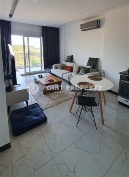 Небольшая квартира 1+1, общей площадью 55 м2, в спокойном районе Аланьи - Авсаллар-id-6304-фото-3