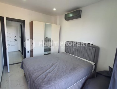 Небольшая квартира 1+1, общей площадью 55 м2, в спокойном районе Аланьи - Авсаллар-id-6304-фото-4