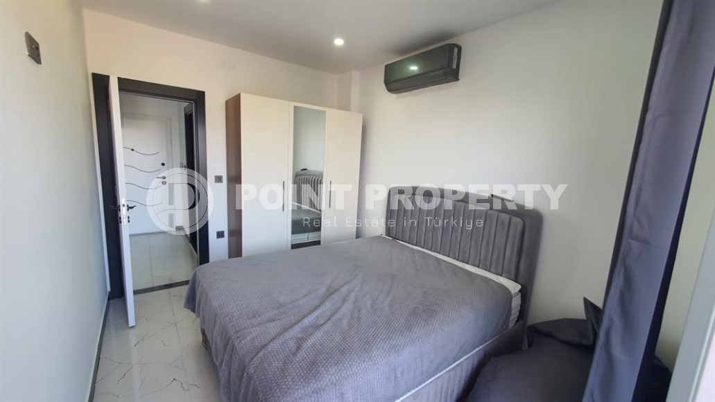 Небольшая квартира 1+1, общей площадью 55 м2, в спокойном районе Аланьи - Авсаллар-id-6304-фото-4