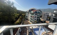 Small apartment with fine finishing, in a picturesque, prestigious area of Alanya - Upper Oba-id-6314-photo-7