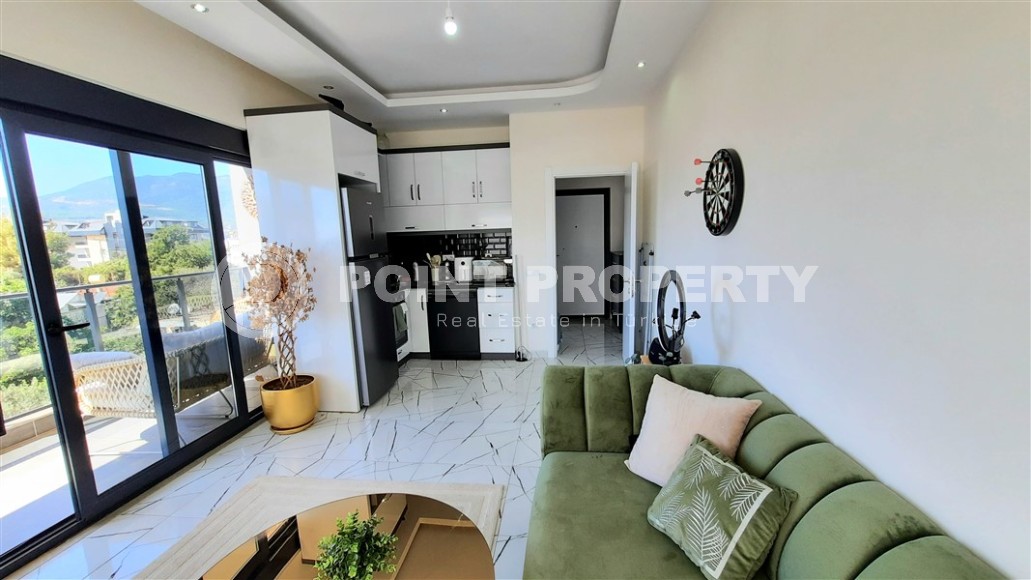 Comfortable apartment with mountain views, on the 2nd floor in a new building, in a prestigious area of Alanya - Upper Oba-id-6317-photo-2