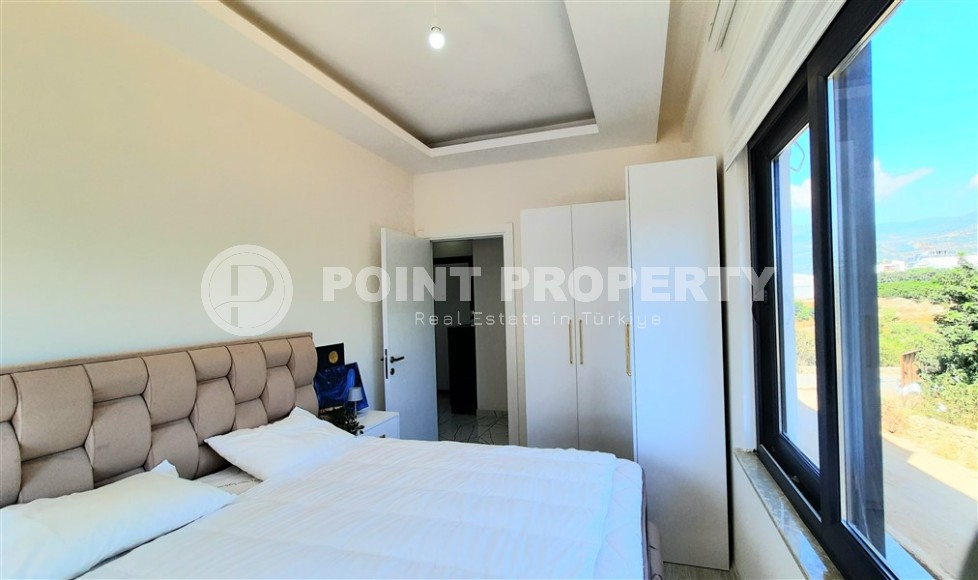 Comfortable apartment with mountain views, on the 2nd floor in a new building, in a prestigious area of Alanya - Upper Oba-id-6317-photo-7
