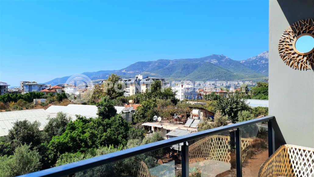Comfortable apartment with mountain views, on the 2nd floor in a new building, in a prestigious area of Alanya - Upper Oba-id-6317-photo-14