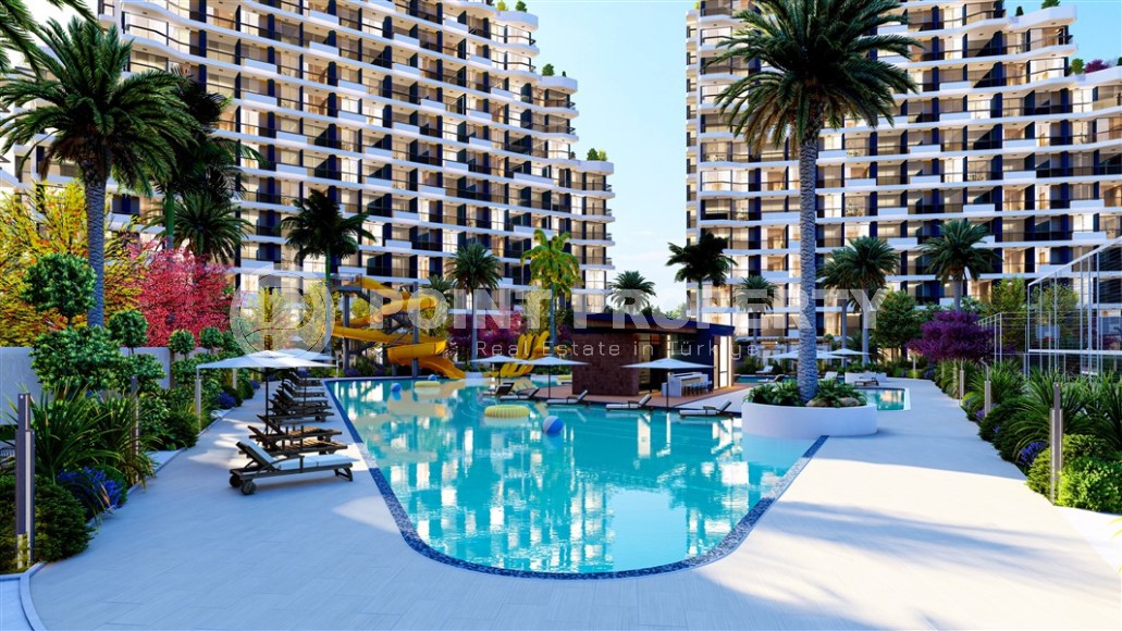 Квартиры и виллы-близнецы в ультрасовременном жилом комплексе на начальном этапе строительства, в 500 метрах от моря-id-6329-фото-12