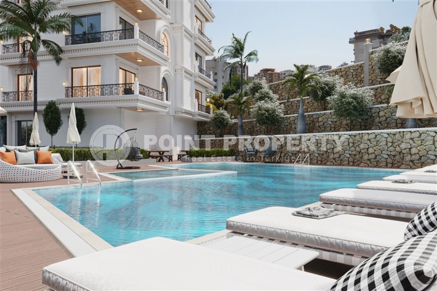 Новый инвестиционный проект - бутик резиденция в 550 метрах от моря, в спокойном районе Аланьи - Тосмур-id-6332-фото-7