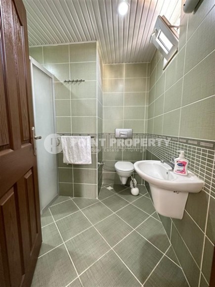 Светлая, уютная квартира с двумя спальнями, в 100 метрах от моря, в центре современного района Аланьи - Махмутлар-id-6334-фото-9