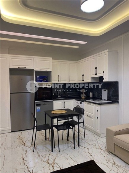 Modern, furnished apartment one and a half kilometers from the sea, in a prestigious area of Alanya - Upper Oba-id-6341-photo-2