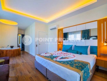 Apartments in a five-star hotel, with ownership rights, and the ability to rent out a room through a management company-id-6344-photo-5