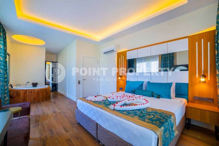 Apartments in a five-star hotel, with ownership rights, and the ability to rent out a room through a management company-id-6344-photo-5