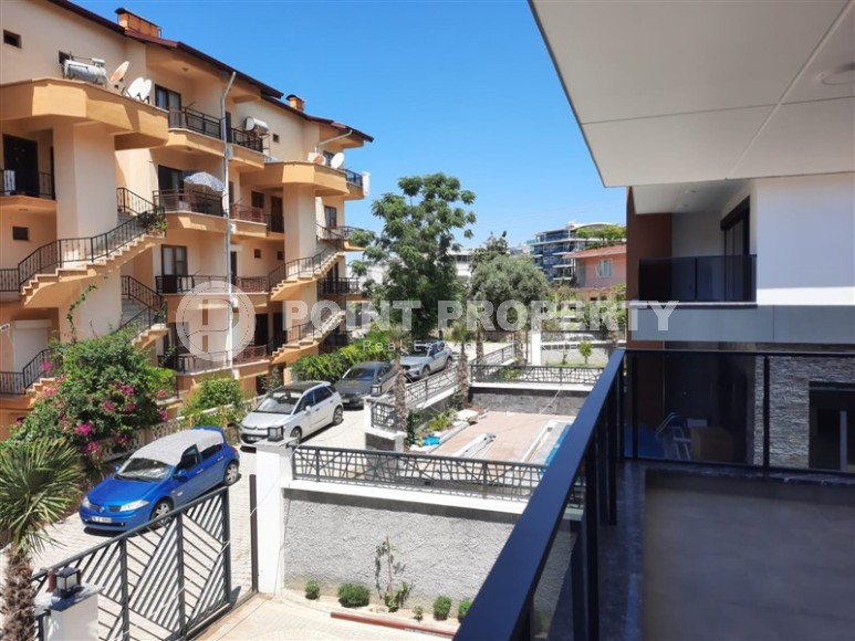 New three-storey villa with fine finishing, 300 meters from the sea, in a quiet area of Alanya - Avsallar-id-6345-photo-14