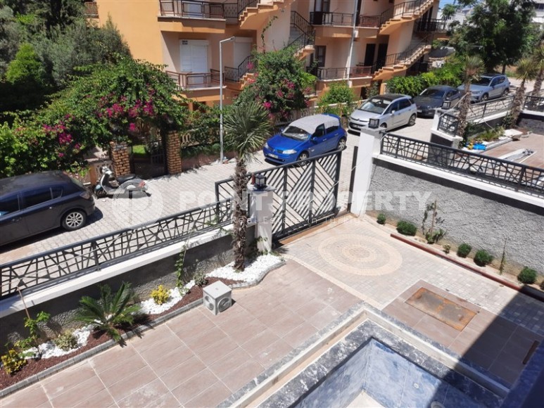 New three-storey villa with fine finishing, 300 meters from the sea, in a quiet area of Alanya - Avsallar-id-6345-photo-17