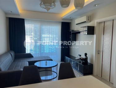 Panoramic apartment with views of the Taurus Mountains, on the 11th floor, in the center of Mahmutlar-id-6350-photo-1