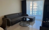 Panoramic apartment with views of the Taurus Mountains, on the 11th floor, in the center of Mahmutlar-id-6350-photo-2