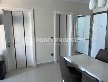 Panoramic apartment with views of the Taurus Mountains, on the 11th floor, in the center of Mahmutlar-id-6350-photo-4