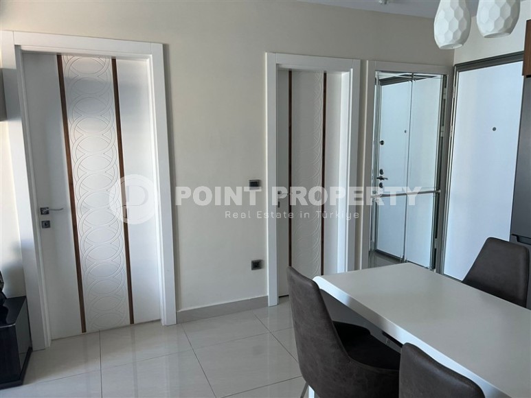 Panoramic apartment with views of the Taurus Mountains, on the 11th floor, in the center of Mahmutlar-id-6350-photo-4