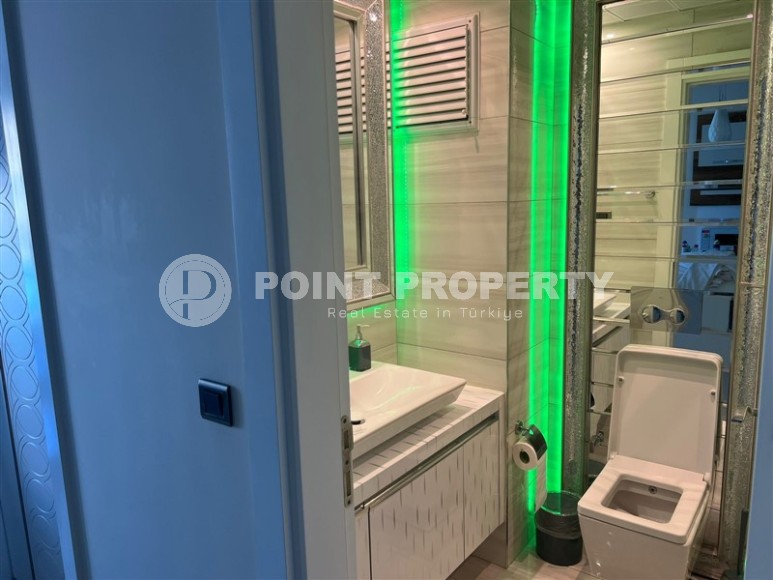 Panoramic apartment with views of the Taurus Mountains, on the 11th floor, in the center of Mahmutlar-id-6350-photo-8