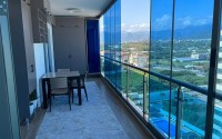 Panoramic apartment with views of the Taurus Mountains, on the 11th floor, in the center of Mahmutlar-id-6350-photo-10