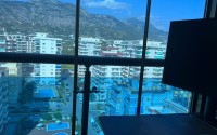Panoramic apartment with views of the Taurus Mountains, on the 11th floor, in the center of Mahmutlar-id-6350-photo-14