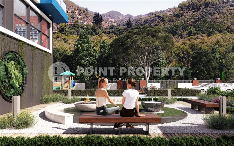 Apartments and duplexes in a residential complex under construction, in a picturesque, ecologically clean area of Alanya - Demirtas-id-6351-photo-2