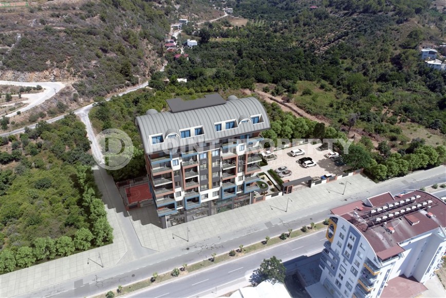 Apartments and duplexes in a residential complex under construction, in a picturesque, ecologically clean area of Alanya - Demirtas-id-6351-photo-11