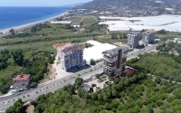 Apartments and duplexes in a residential complex under construction, in a picturesque, ecologically clean area of Alanya - Demirtas-id-6351-photo-12