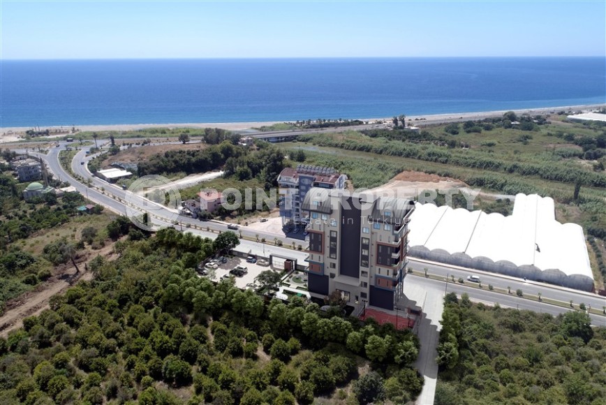 Apartments and duplexes in a residential complex under construction, in a picturesque, ecologically clean area of Alanya - Demirtas-id-6351-photo-13