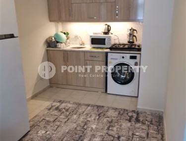 Small comfortable apartment 1+1, on an area of 50 m2, in the center of the modern area of Alanya - Mahmutlar-id-6356-photo-3